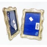 A pair of silver fronted photograph frames, one with worn easel back, the other missing - Birmingham