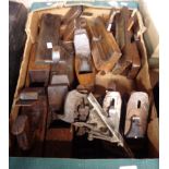 A selection of vintage wood planes including Stanley, Record, box planes, etc.