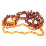 Two multi coloured natural amber bead necklaces