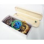 A box containing assorted jewellery, including jadite bangle, enamelled bracelet and boxed Lotus
