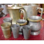A collection of Victorian and later pub measures and jugs