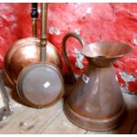 A large copper measure - sold with two bed warming pans