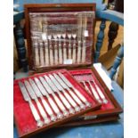 A mahogany case containing a part set of ornate silver plated fruit knives and forks - sold with two