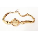 A vintage rotary lady's 9ct. gold cased wristwatch on 9ct bracelet