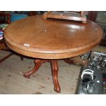 A 1.34m Victorian mahogany oval tilt-top loo table, set on massive turned pillar and cabriole scroll