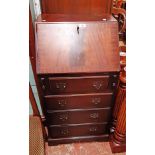 A 51cm 20th Century reproduction mahogany and cross banded bureau with part fitted interior and
