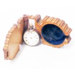 A vintage anodised cased Omega lever fob watch - sold with an associated decorative carved wood