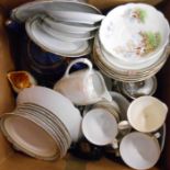 A box containing china including teapots, teaware, etc.