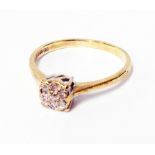An import marked 375 gold diamond illusion cluster ring