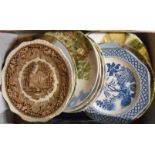 A box containing assorted china including blue and white meat plates, collectors' plates, etc.