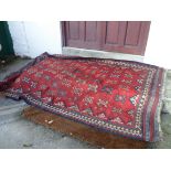 A large Middle Eastern Kelim with all over geometric motif design and repeat border - 157cm X 280cm