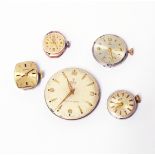 A Tudor Royal gentlemen's 17 jewel watch movement and four Tudor lady's wristwatch movements -