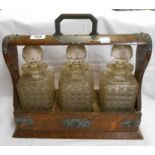 A three bottle Tantalus with Masonic presentation plaque for 1894 - unmarked, no key