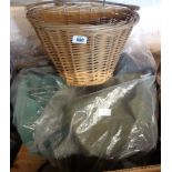 A wicker bicycle basket - sold with a pair of size 10 1/2 waders and a waterproof coat