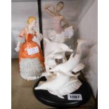 A Lladro ballerina figure G323 (one finger a/f) - sold with a Brooks and Bentley dolphin group and