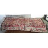 A Turkish Kelim runner with repeat medallions and matching flanking borders - 114cm X 270cm