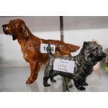 Two Royal Doulton dog figurines Red Setter HN 1055 (tail damaged and repaired), and Cairn Terrier HN