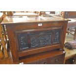 A 73cm 20th Century coffer style linen chest with decorative carved decoration to front and
