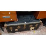 A 92cm vintage travelling trunk with tray fitted interior and various transit labels