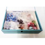 A box containing assorted jewellery beads including modern cloisonne, also glass hearts, etc.