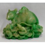 A resin model of lucky rats