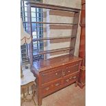 A 1.16m antique oak dresser base with pair of panelled cupboard doors and short drawers under, set