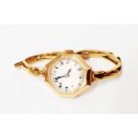 A vintage 9ct. gold cased lady's wristwatch, on marked 9ct expanding bracelet