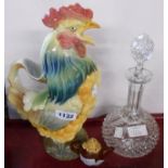 A large pottery jug in the form of a cockerel - sold with a cut crystal decanter and a David