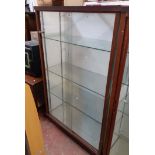 A 93cm vintage shop display cabinet with painted and clear glass panel and shelves enclosed by