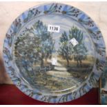 A David Eeles studio pottery charger decorated with a painted rural scene
