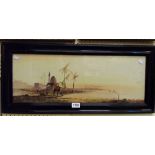 S.H. Ball: an ebonised framed watercolour, depicting a desert landscape with figures and camels on