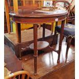 A 77cm late Victorian mahogany two tier occasional table, set on turned and tapered supports