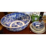 A large Japanese porcelain fluted bowl handpainted in blue with continuous frieze and figures, the