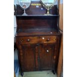 A 74cm Regency mahogany and brass inlaid chiffonier with decorative inlay to raised shelf back