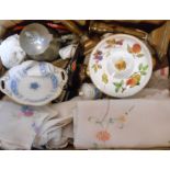 A box containing assorted items including Evesham, brass candlesticks, linen, etc.