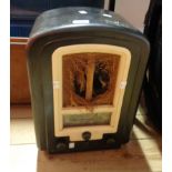 A Ferranti bakelite cased radio - speaker fabric perished