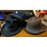 A Christys of London brown fedora hat - sold with two Dunn & Co. black similar