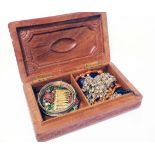 An Indian decorative carved hardwood box containing a small quantity of costume jewellery and pair