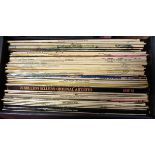 A case containing vintage vinyl LP records, including The Beatles, Labi Siffre and Top of the