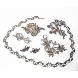 A harlequin suite of silver and white metal marcasite set jewellery including 1956 fancy-link