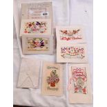 A small quantity of First World War embroidered and other postcards
