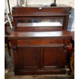 A 103cm Victorian walnut chiffonier with mirror set raised back and flanking spindles to shelf