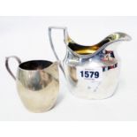 A late Georgian silver cream jug with cast reeded rim - London 1801 - sold with a Mappin & Webb