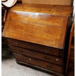 A 95cm late Georgian oak bureau, fitted interior with three banks of four drawers over three long