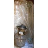 A box containing assorted glassware including oil lamp, Victorian glass rolling pin, decanter