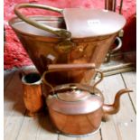 A copper scuttle, kettle and jug