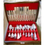 A Flexfit oak canteen containing a six place setting of silver plated Kings pattern cutlery