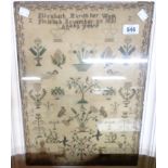 A framed 19th Century sampler by Elizabeth Martin aged 9 and dated 1831 - faded