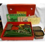 A 1930s Meccano No 6 box with related contents - sold with a tin of further Meccano parts