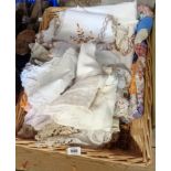 A box containing a quantity of old linen including a patchwork quilt, etc.